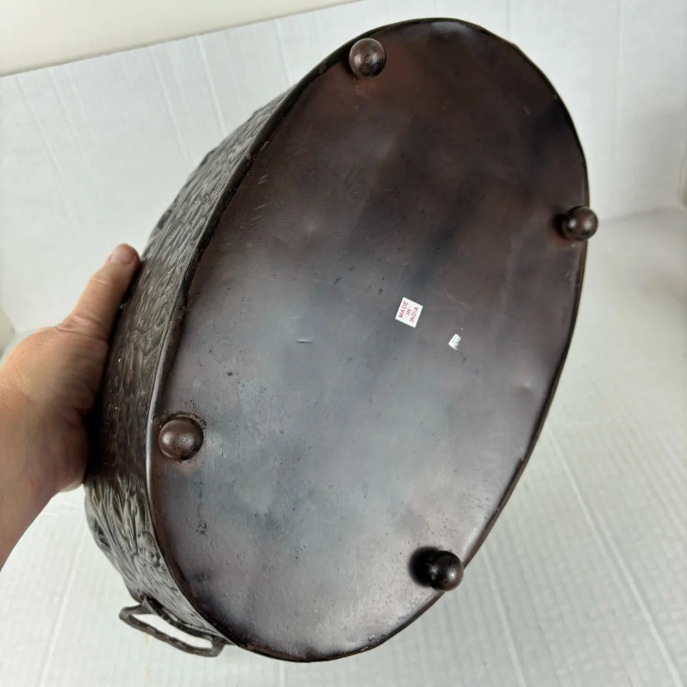 Metal oval planter/basket with scalloped edge and embossed design